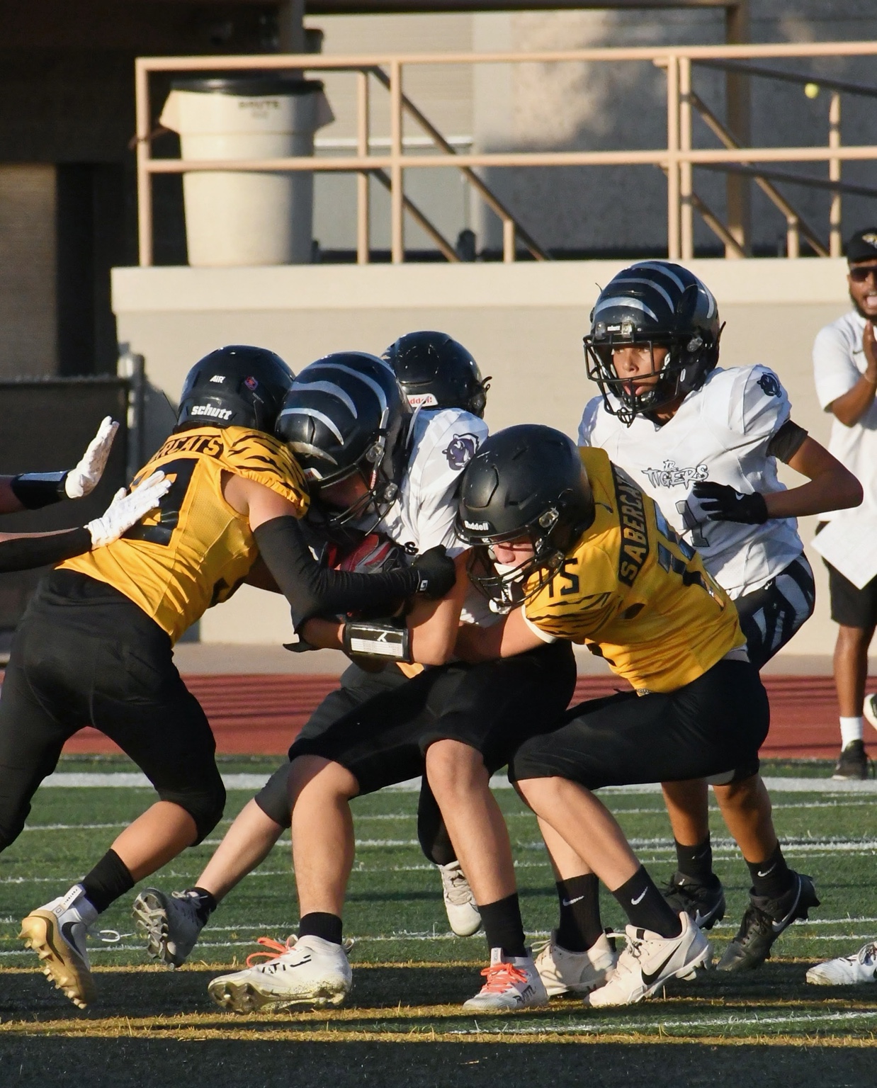 Sabercats defenders working together to make a tackle
